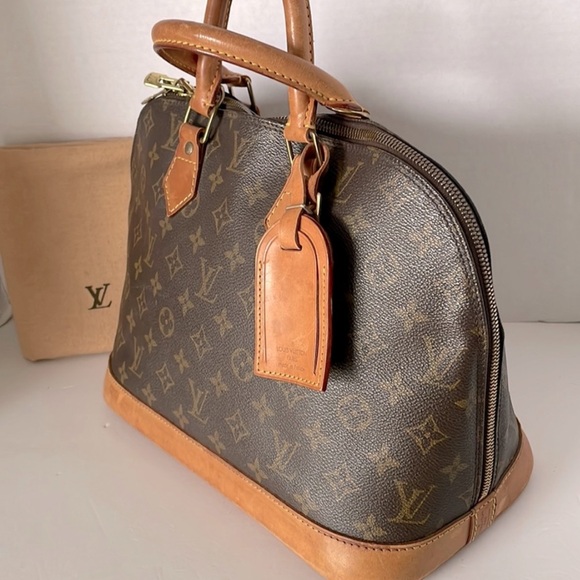 Authentic LOUIS VUITTON Alma Monogram Handbag - Picture 3 of 17